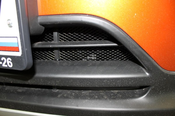 Установка защитной сетки радиатора на Chevrolet Tracker 